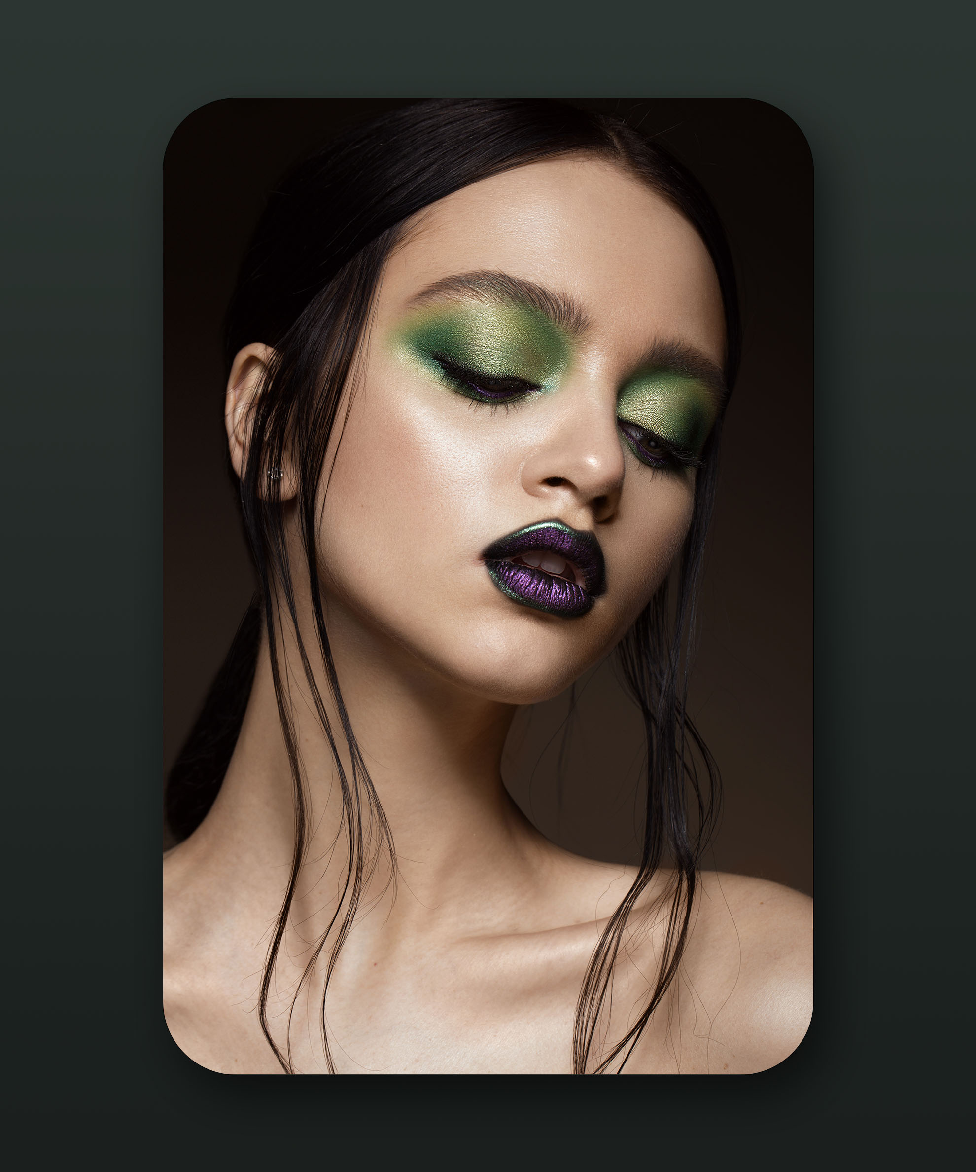 Beautiful girl with spring green makeup and vampire lips. beauty face.